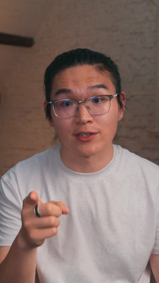 A 9:16 talking-head clip with three motion graphics